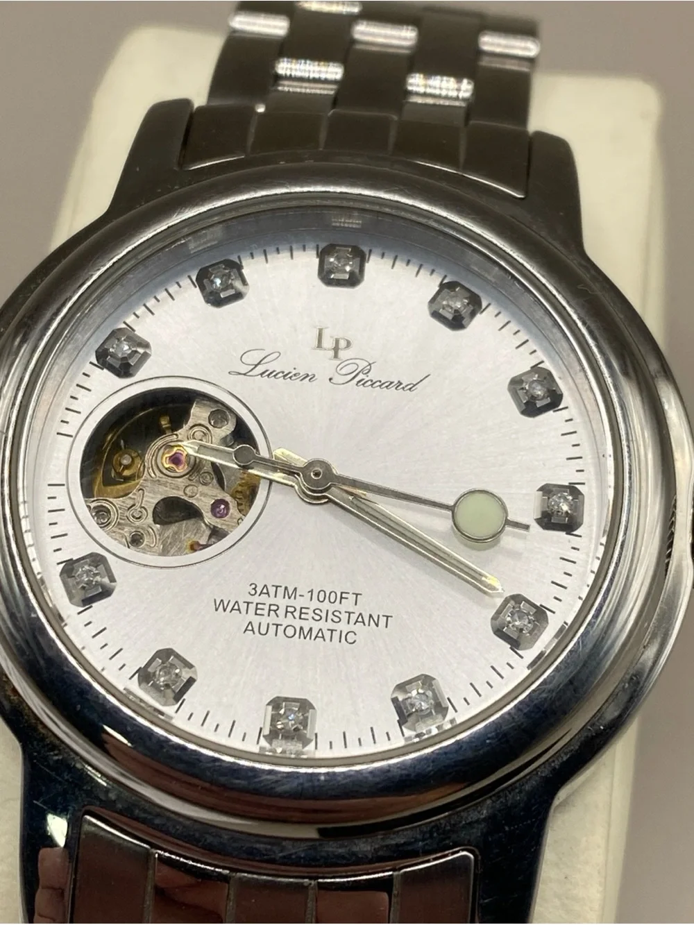 Lucien Piccard automatic stainless steel with diamond  stone very good condition